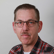 A headshot of Professor Theo de Waal